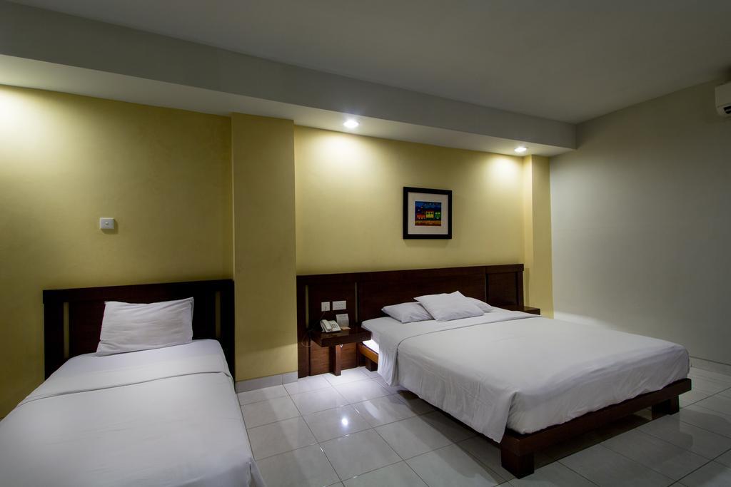 Hotel Quirin Семаранг Номер фото